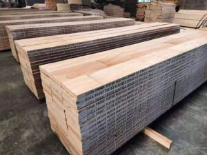 engineered wood platforms widely utilized in construction scaffolding to provide high-strength, uniform, and reliable walking decks for workers.